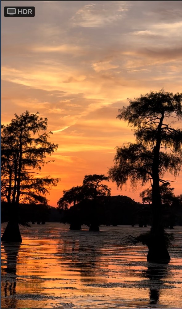 a sunset over a body of water